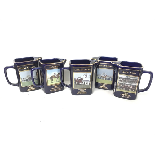 1138 - A collection of Martell Grand National jugs