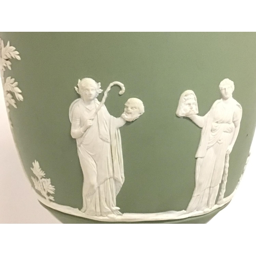 1148 - A Wedgwood neo-classical green Jasper urn, 27cm tall approximately. Postage cat D