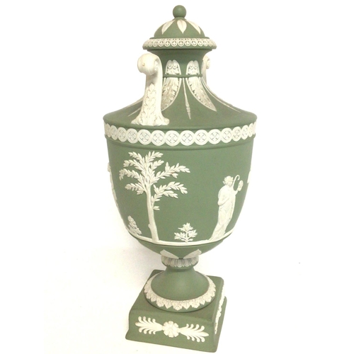 1148 - A Wedgwood neo-classical green Jasper urn, 27cm tall approximately. Postage cat D