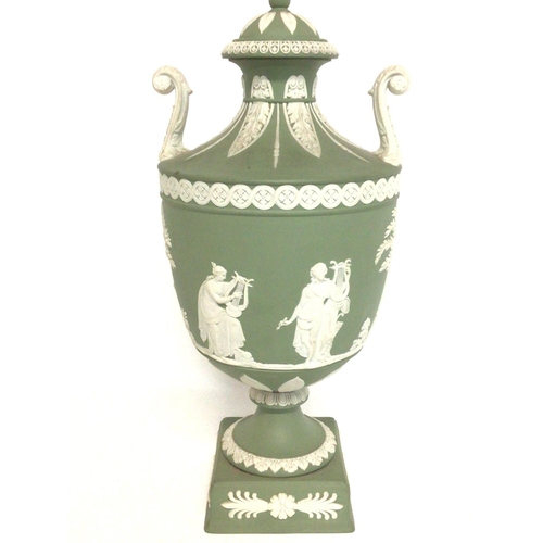 1148 - A Wedgwood neo-classical green Jasper urn, 27cm tall approximately. Postage cat D