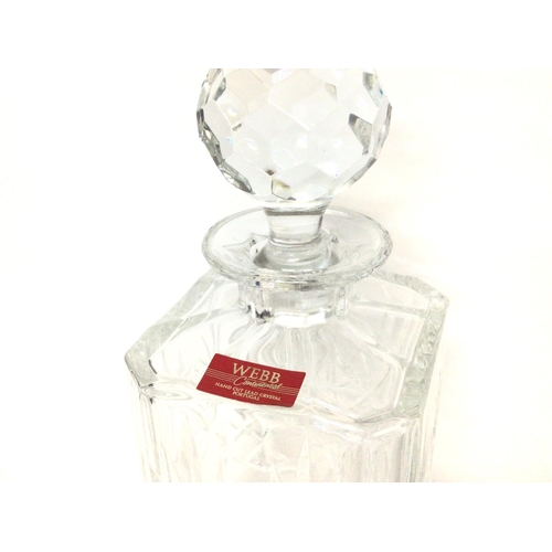 1158 - A boxed Webb Crystal decanter, approximately 22cm tall. postage cat D