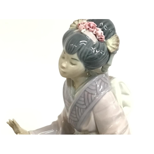 1194 - Lladro porcelain figure group Japanese ladies on bridge, 14x32x35cm. No obvious signs of damage / re... 