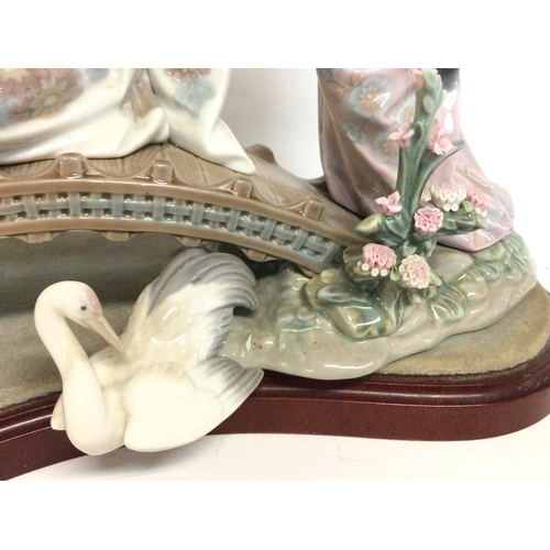 1194 - Lladro porcelain figure group Japanese ladies on bridge, 14x32x35cm. No obvious signs of damage / re... 