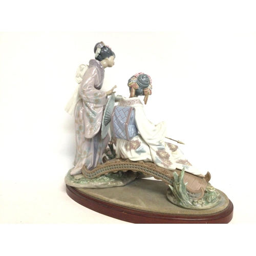 1194 - Lladro porcelain figure group Japanese ladies on bridge, 14x32x35cm. No obvious signs of damage / re... 