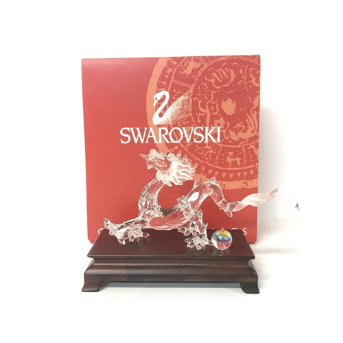 1206 - Boxed Swarovski Crystal Zodiac dragon , postage cat d. No signs of obvious damage/restoration