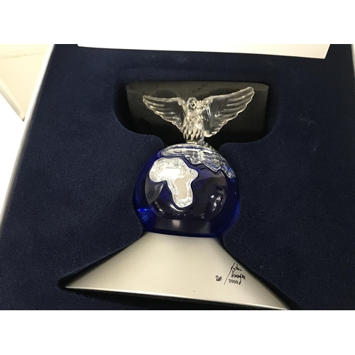 1212 - Boxed Swarovski Crystal Planet Vision 2000 and three boxed Swarovski paperweights. Postage cat D, no... 