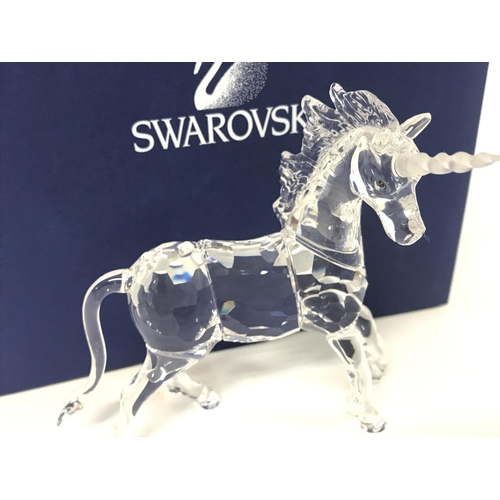 1216 - Boxed Swarovski unicorn figurine ,postage cat D no signs of obvious damage/ restoration