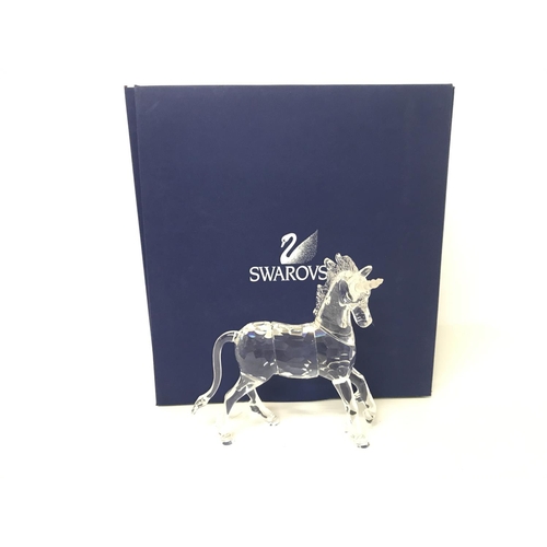 1216 - Boxed Swarovski unicorn figurine ,postage cat D no signs of obvious damage/ restoration