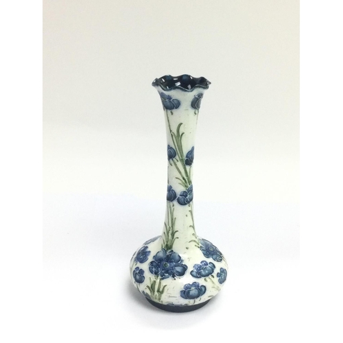 1243 - A William Moorcroft Macintyre & Co early 20th Century Florian Ware vase decorated with tubelined blu... 