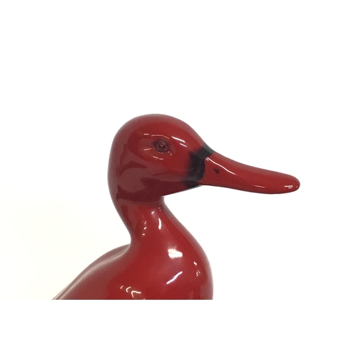 1248 - Porcelain Doulton Flambe Duck, 15cm tall. Postage cat D