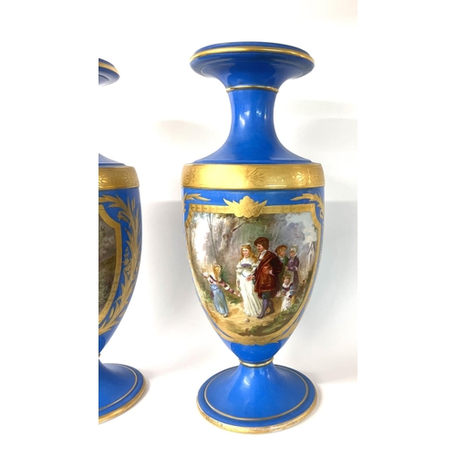 1264 - A pair of large 19thC hand painted Sevres style porcelain blue ground vases with hand painted villag... 