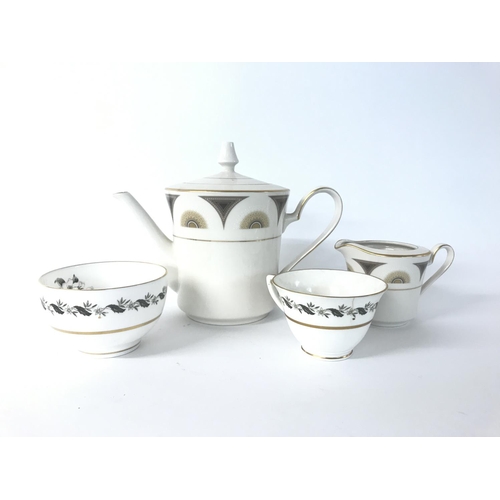 1279 - A large collection of tea sets including Noritake, Aragon Minton & a Royal Worcester tea set in Beri... 