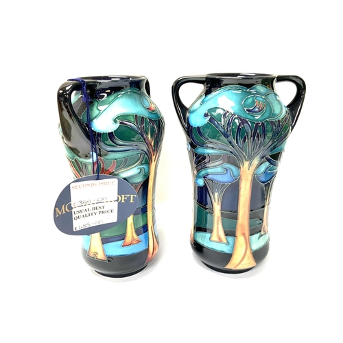 1296 - A pair of contemporary Moorcroft Moonlit Sonata 2 handled vase dated 2008, Second quality. 19cm (D)