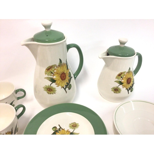 1299 - A Wedgwood sunflower pattern tea set. There is a small chip to one cup and a small chip to two of th... 