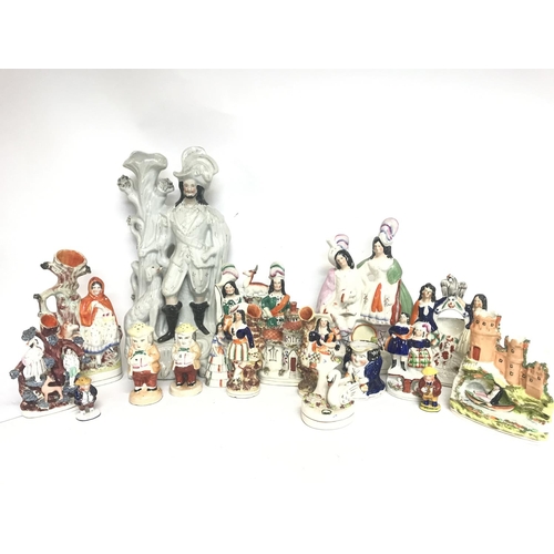 1300 - A large collection of Staffordshire porcelain figures consisting of Little Red Riding hood, Robin Ho... 