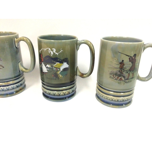 1304 - A collection of five musical mugs. No chips or cracks observed. Postage D