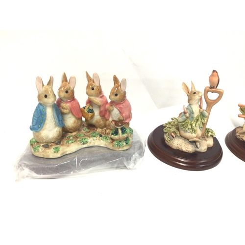 1310 - Four Beatrix Potter ceramic figures. All in excellent condition. Postage D