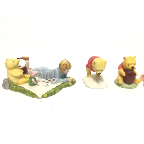 1312 - Winnie the Pooh figurines by Royal Doulton and Border fine arts. No damage on any of the figurines.