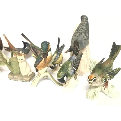 1322 - A collection of Porcelain & resin W. Gobel birds, postage cat D. No obvious signs of damage or resto... 