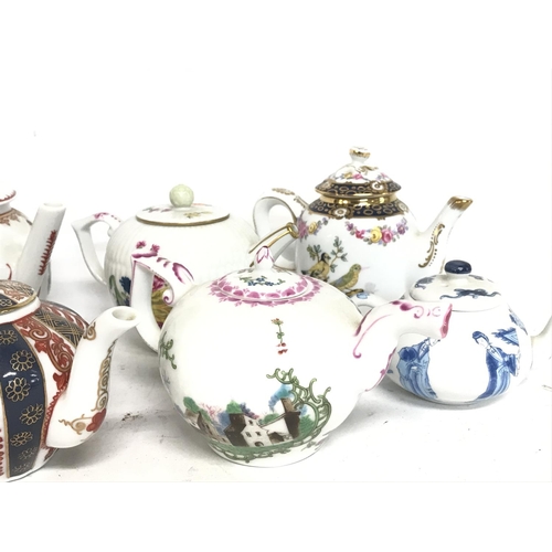 1324 - Small Franklin Mint tea pots, postage cat D