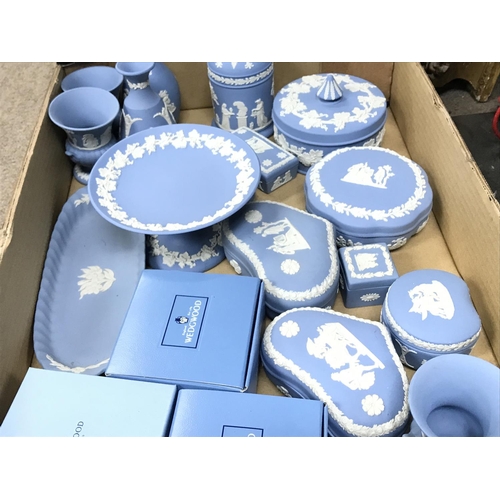 1325 - Two boxes of wedgewood including dishes, trinket boxes etc. Postage cat d, no obvious signs of damag... 