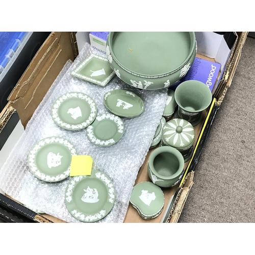 1326 - Two boxes of green wedgwood including vases, lidded trinket boxes etc. No obvious damage