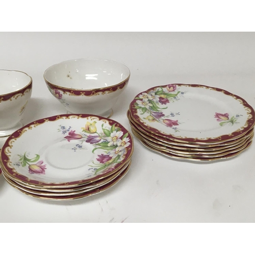 1340 - A decorative British fine bone china tea set Queen Anne six place setting complete with cream jug an... 