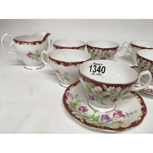 1340 - A decorative British fine bone china tea set Queen Anne six place setting complete with cream jug an... 