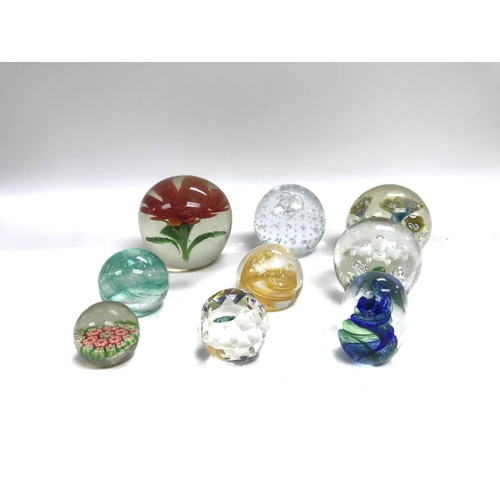 1341 - A collection of glass paper weights. Shipping category C.