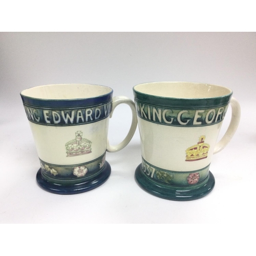 1364 - Two Moorcroft coronation mugs comprising one for King Edward VIII (cracked) and the other for King G... 