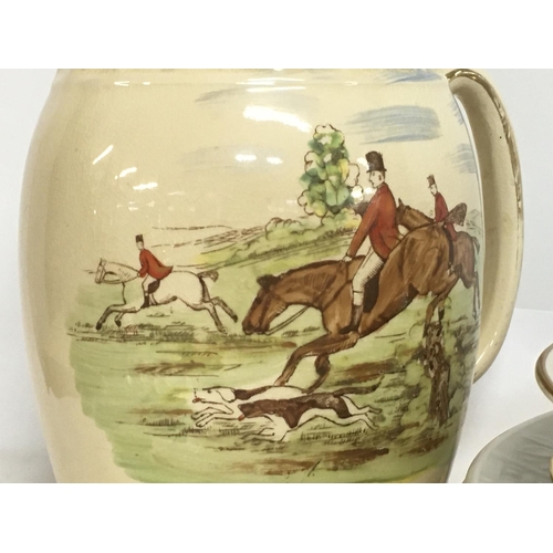 1390 - A collection of ceramics including an Arthur Wood jug depicting fox hunters, Royal Doulton Impressio... 