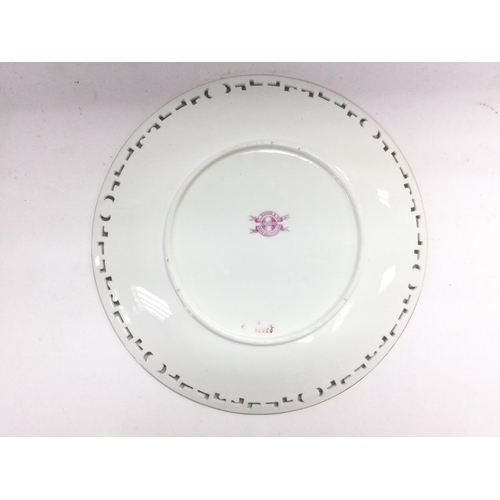 1395 - A Minton pate-sur-pate plate by Desire Leroy decirated with birds and foliage, approx diameter 24cm.... 