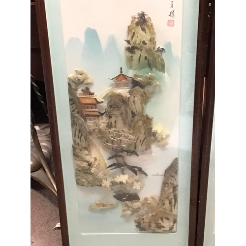 1502 - Chinese Hardstone framed scenes of mountains, sailboats and Chinese architecture displayed in glazed... 