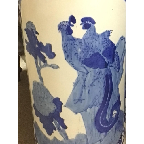 1503 - Ceramic blue and white Umbrella stand with depictions of peacocks and naturalistic scenery (46cm tal... 