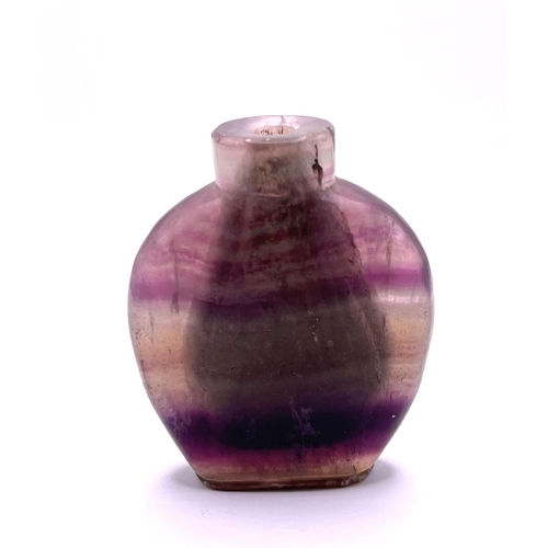 1523 - A 19thC banded amethyst snuff bottle, 7.5cm, with Chinese customs export label attached.