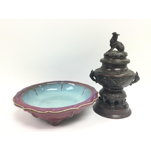 1542 - A reproduction bronze censer and a sang de boeuf dish, approx diameter 25.5cm. Shipping category D.