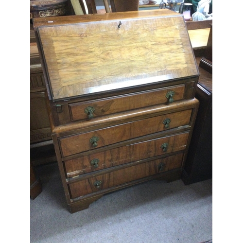 1604 - A 20th Century walnut bureau, approx 76cm x 102cm x 40.5cm. Shipping category D.