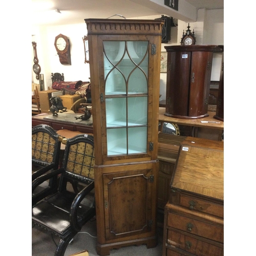 1608 - A yew wood corner cabinet, approx height 184cm. Shipping category D.