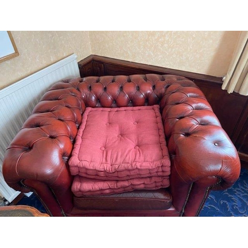 1620 - A single red leather button back club chair