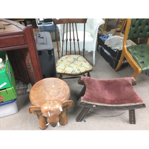 1647 - A carved hardwood seat in the form of an elephant, a carved footstool and stickback chair with tapes... 