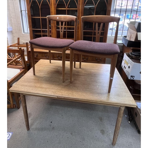 1651 - A vintage BAASTRUP Denmark, Teak dining table and 4 dining chairs.