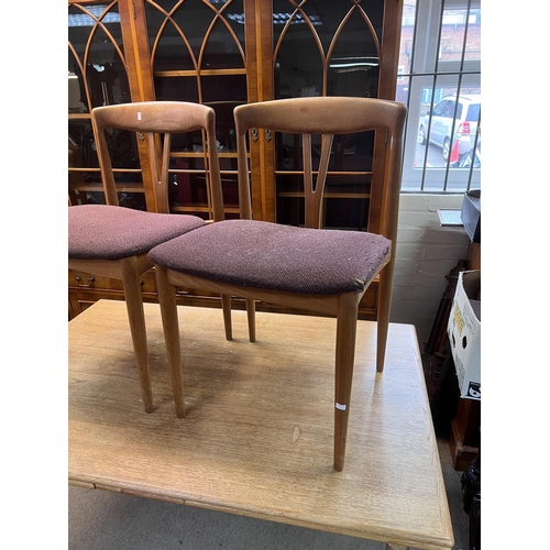 1651 - A vintage BAASTRUP Denmark, Teak dining table and 4 dining chairs.