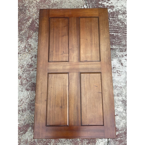 1655 - A mahogany folding bagatelle table, circa 1860, panelled front.