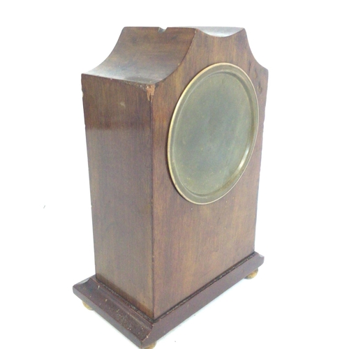 1661 - Small mahogany Edwardian clock in a mahogany inlaid case. In working order, 21cm tall. postage cat D