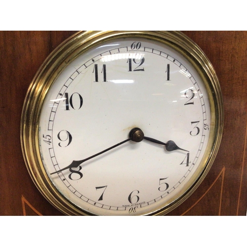 1662 - Edwardian mahogany clock with brass handle and feet with French drum movement, working order. 26cm t... 