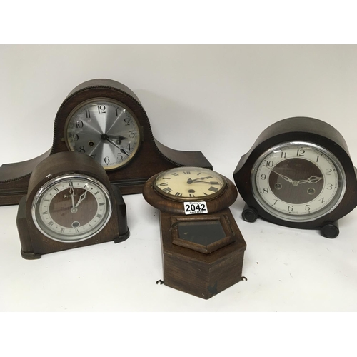 1681 - A small stained pine early 20th century wall clock and three other oak mantel clocks (4) NO RESERVE