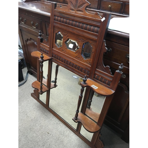 1699 - An Edwardian walnut overmantel mirror with bevelled edge open shelfs and turned supports. NO RESERVE