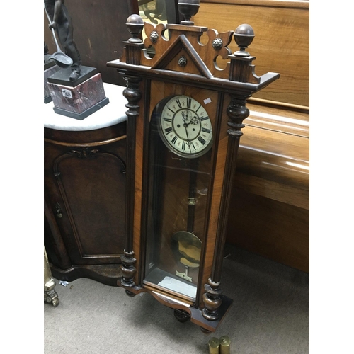 1708 - A Vienna style Continental wall clock with a visible pendulum and two brass weights