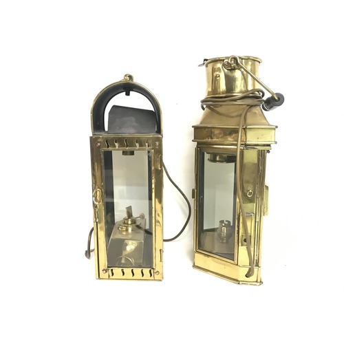 1719 - Two brass and glass ship lamps, electric and oil, 35 & 40cm tall. Postage cat D