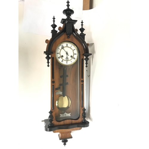 1720 - Wall Clock with key and pendulum ,in a oak case with ebonised embellishments. Approximately 90cm lon... 